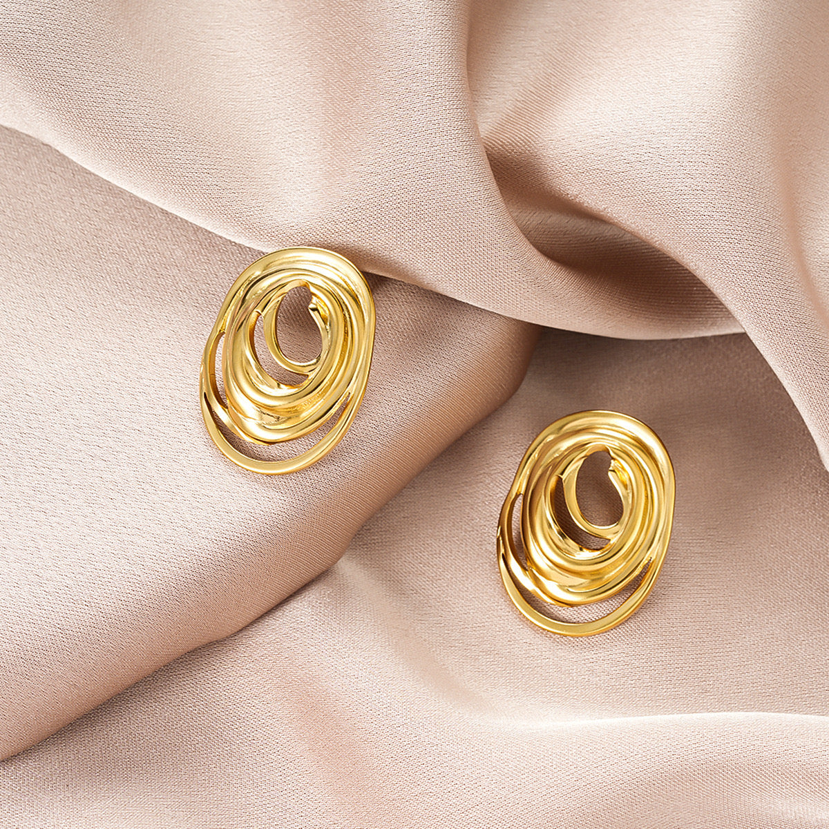 Sculpted Gold Swirl Statement Earrings